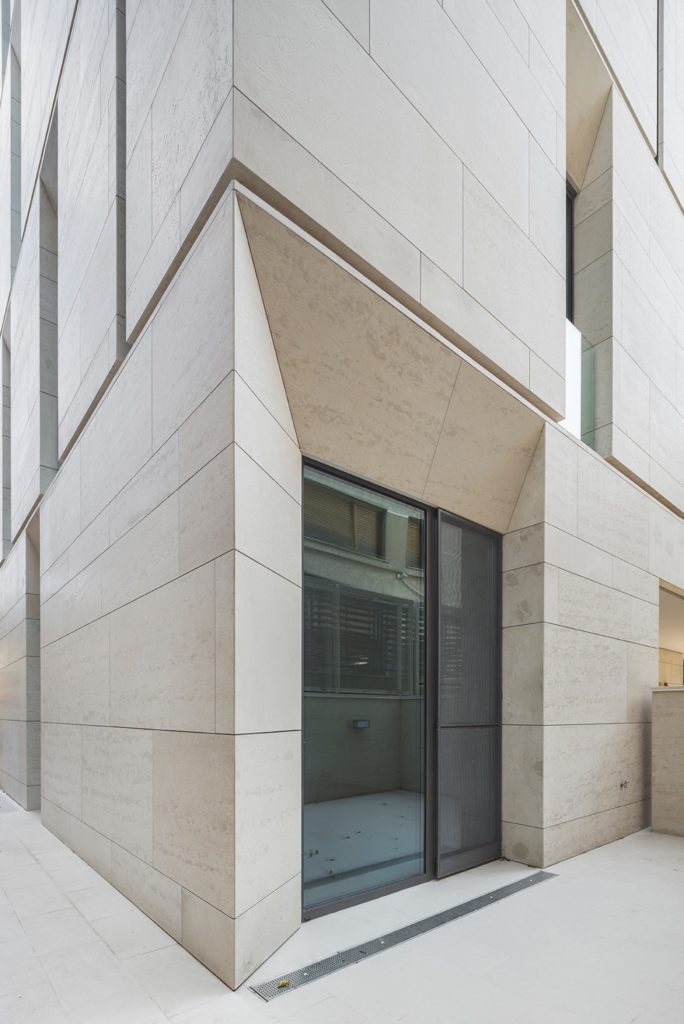 limestone cladding, MORA Residential Building by ADN Birou de Arhitectura