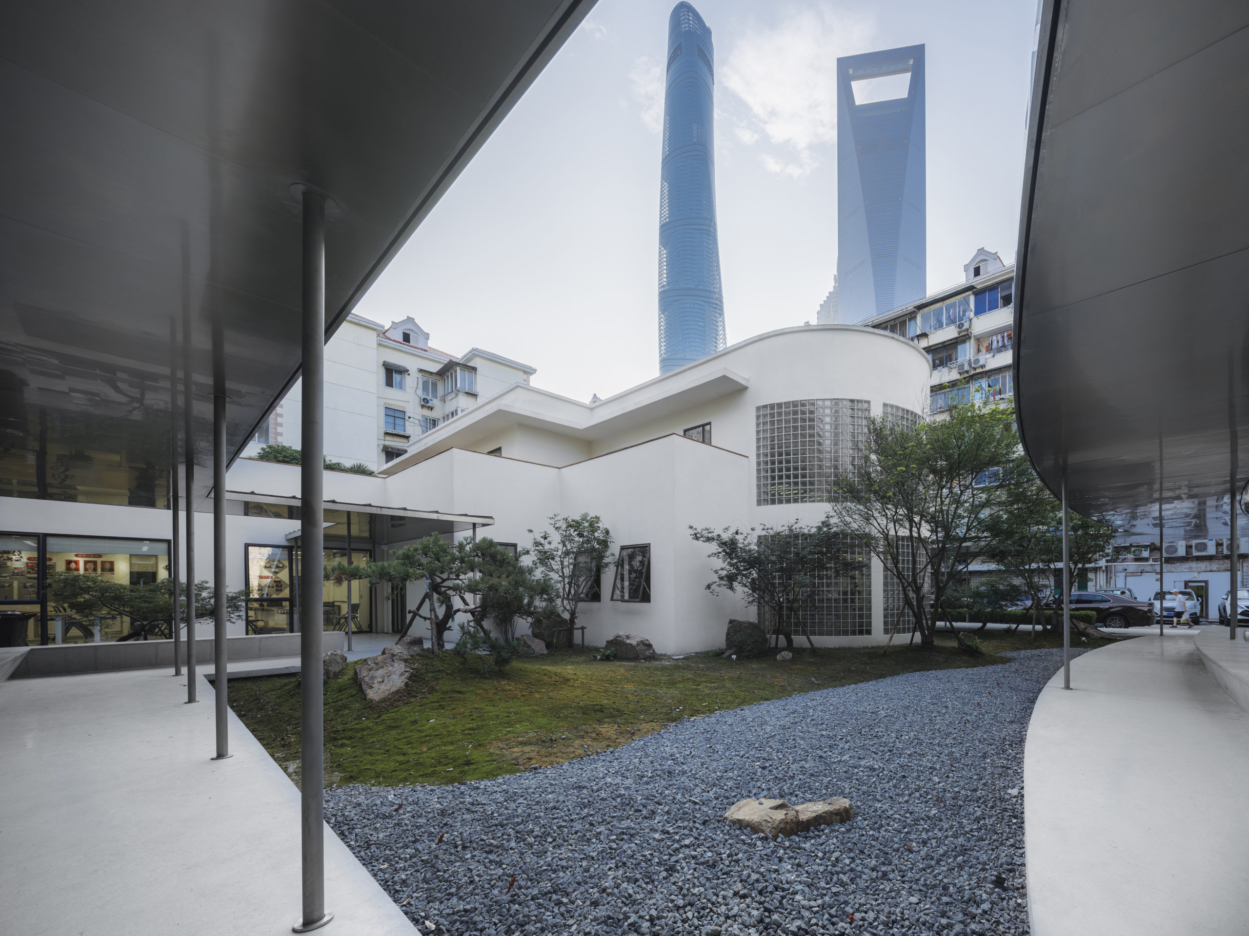 Community center in Shanghai exterior view with skyscrapers in background