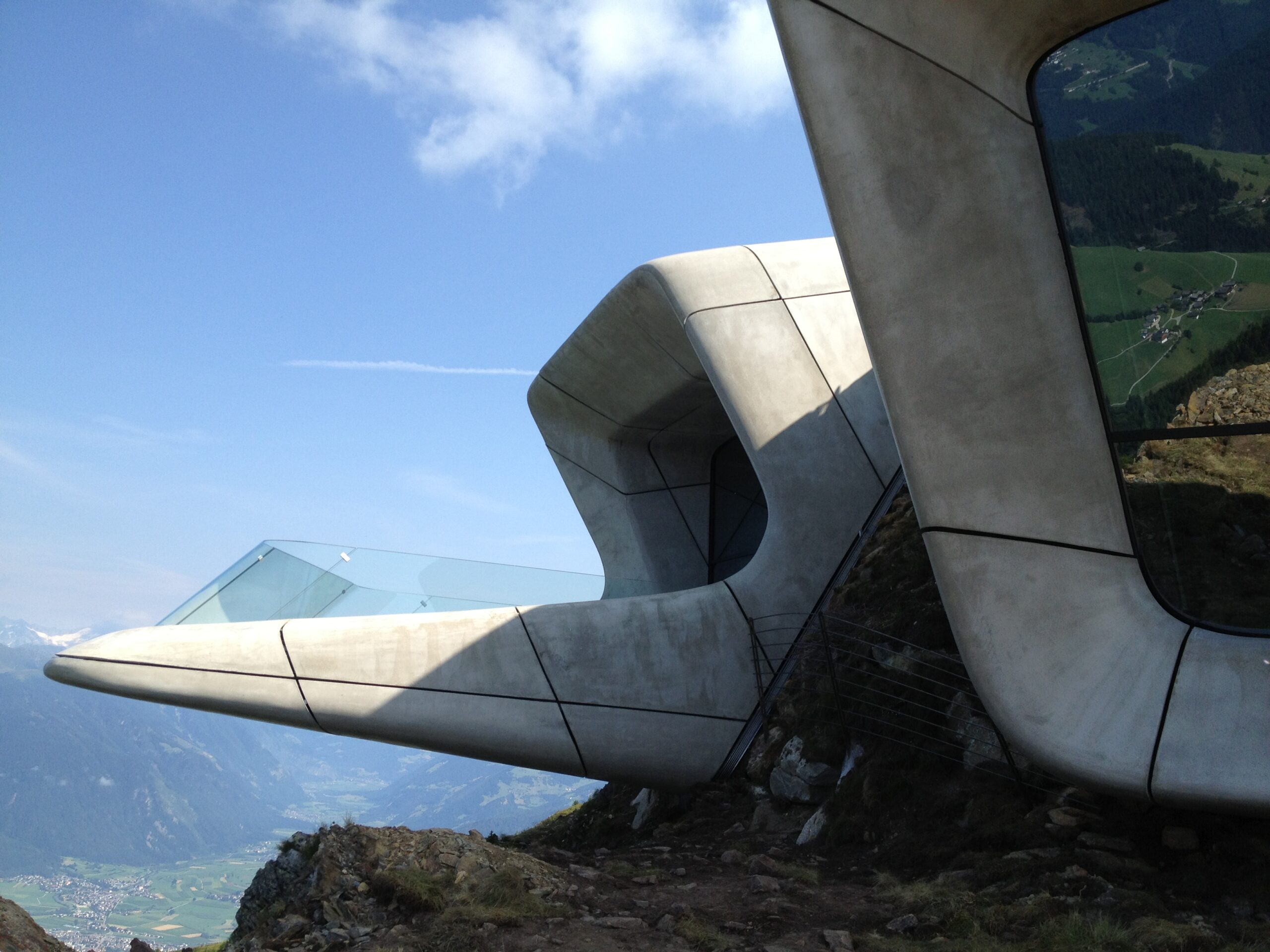 A view of Messner Mountain Museum by Zaha Hadid Architects showing the building emerging from the mountain