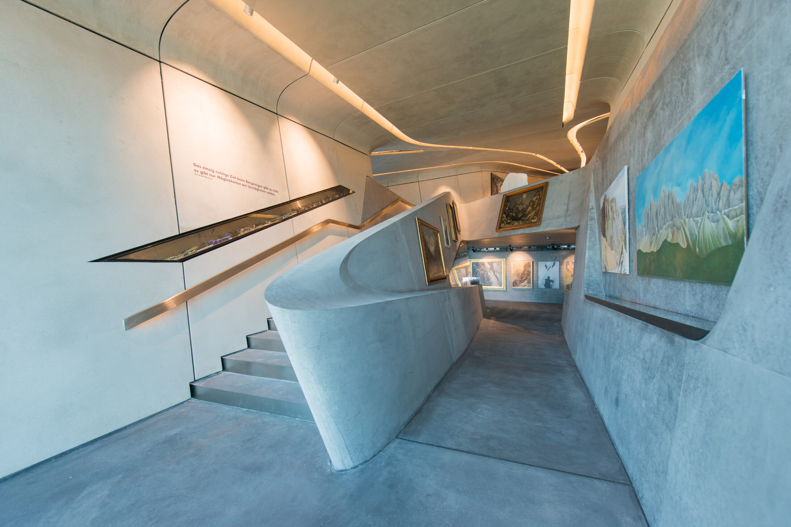 A view of the uneven concrete interior of Messner Mountain Museum Coronesby Zaha Hadid Architects