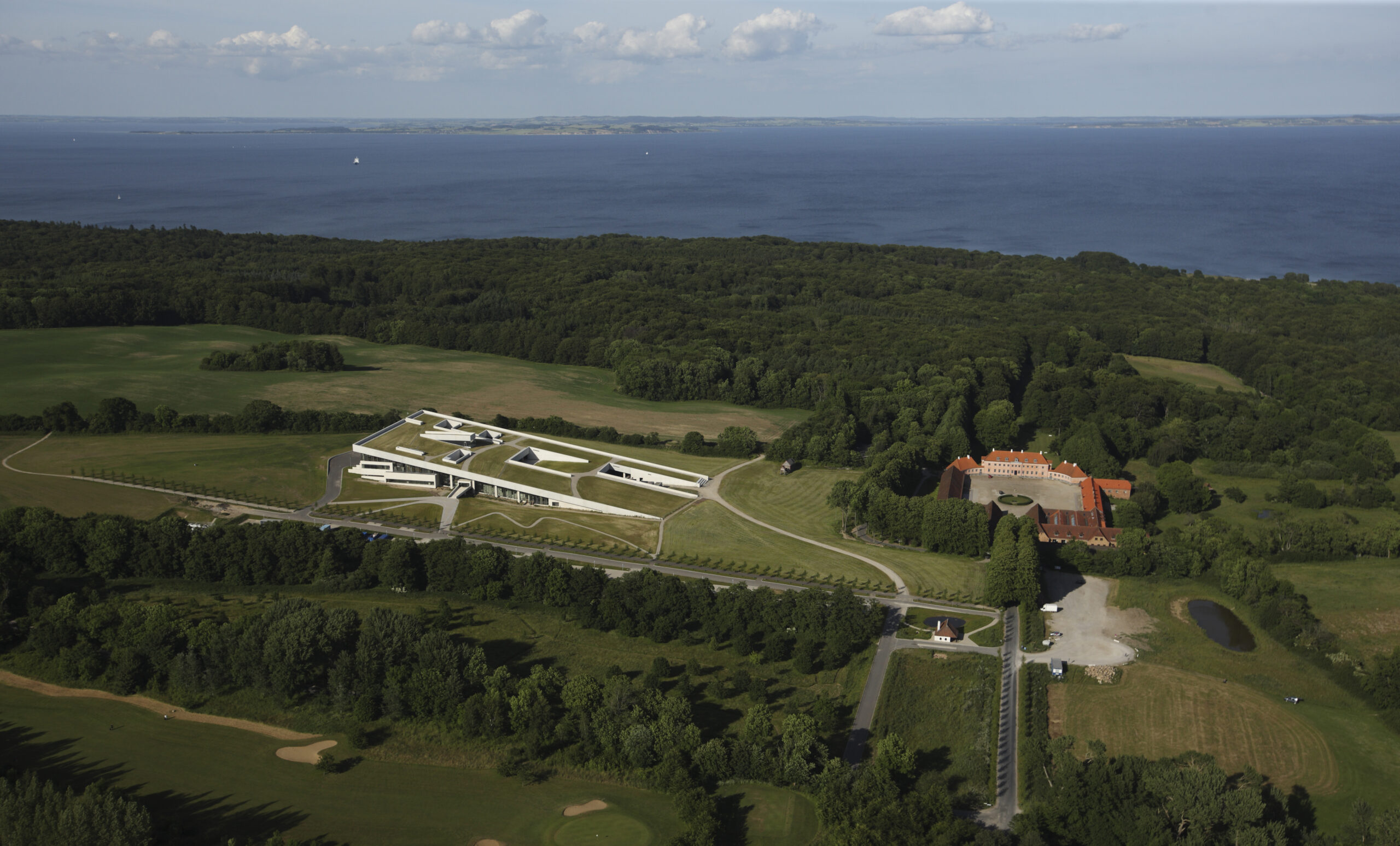 A semi-areal view showing Moesgaard Museum by Henning Larsen blending with the landscape
